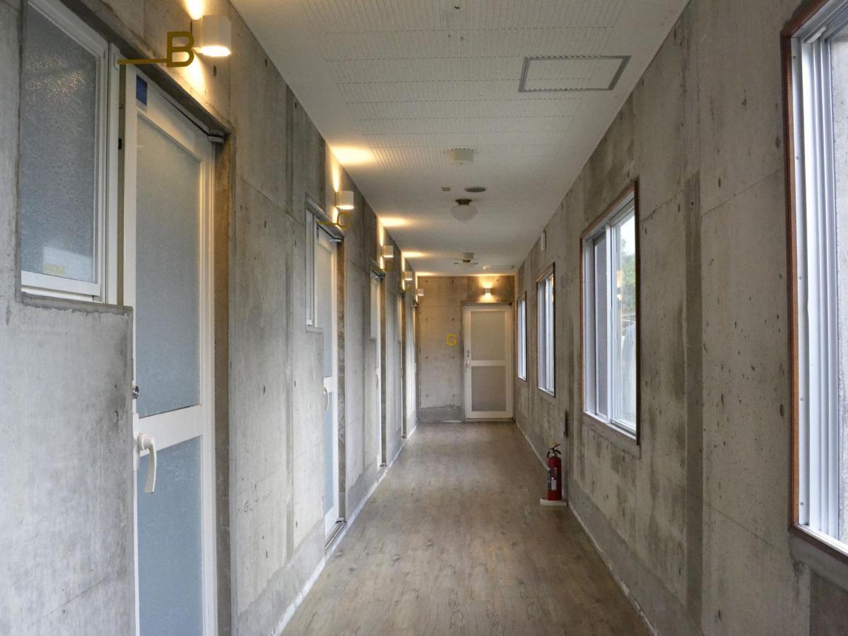Denpaku Amami Hotel Bagian luar foto