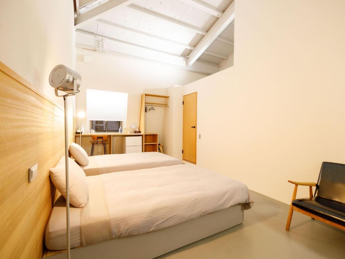 Denpaku Amami Hotel Bagian luar foto