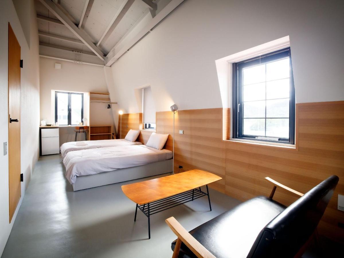 Denpaku Amami Hotel Bagian luar foto