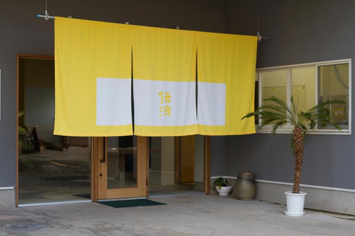 Denpaku Amami Hotel Bagian luar foto